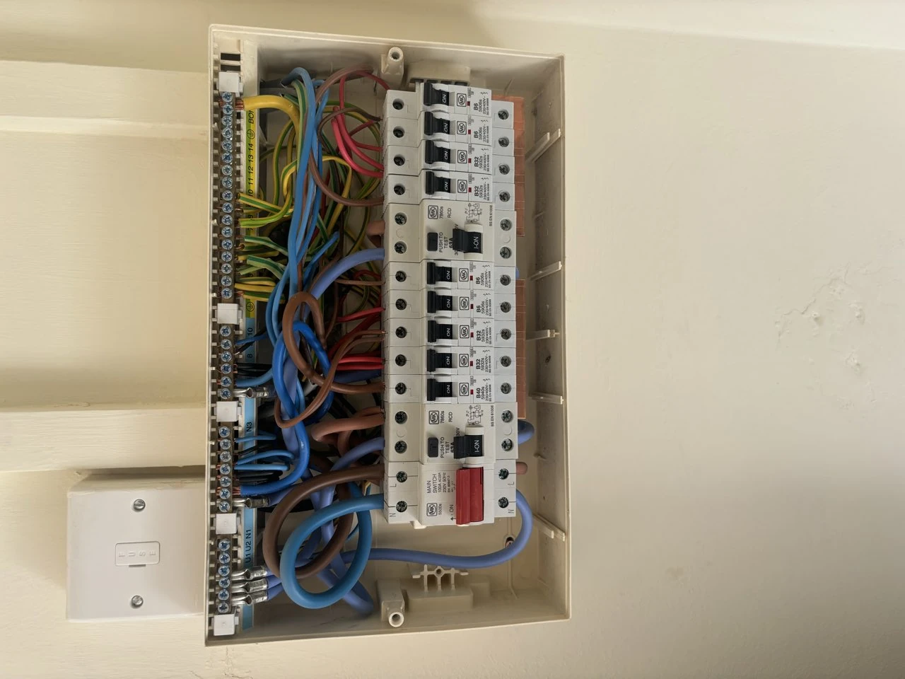 Before: Old fuse board replaced with a fully certified consumer unit, London