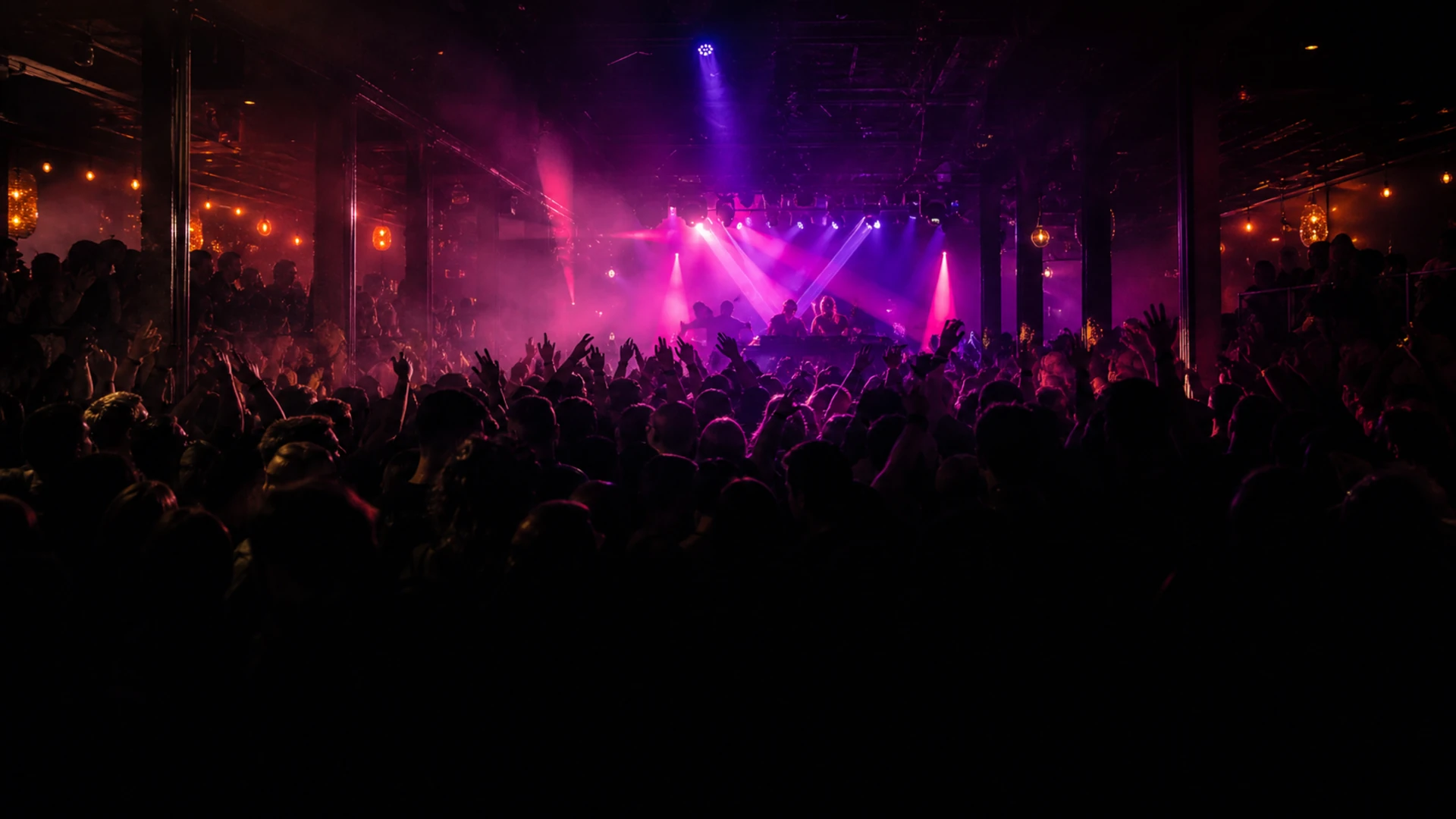 Crowd at a Brunch N Vibes event under neon pink and purple lights